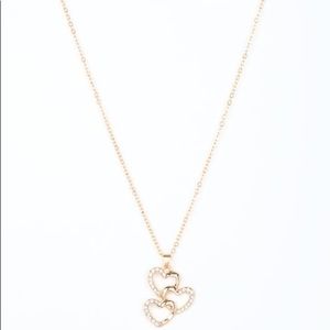 Gold three hearts necklace